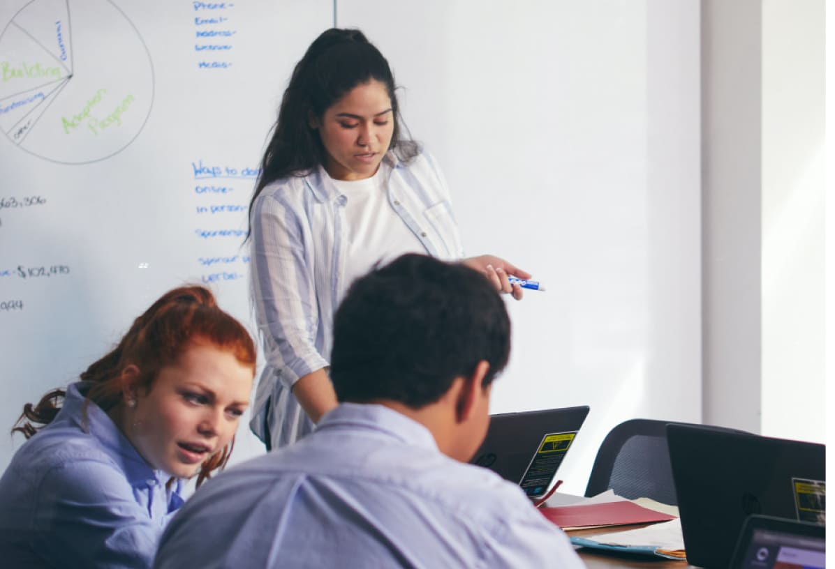 Career and college prep students working with their laptops